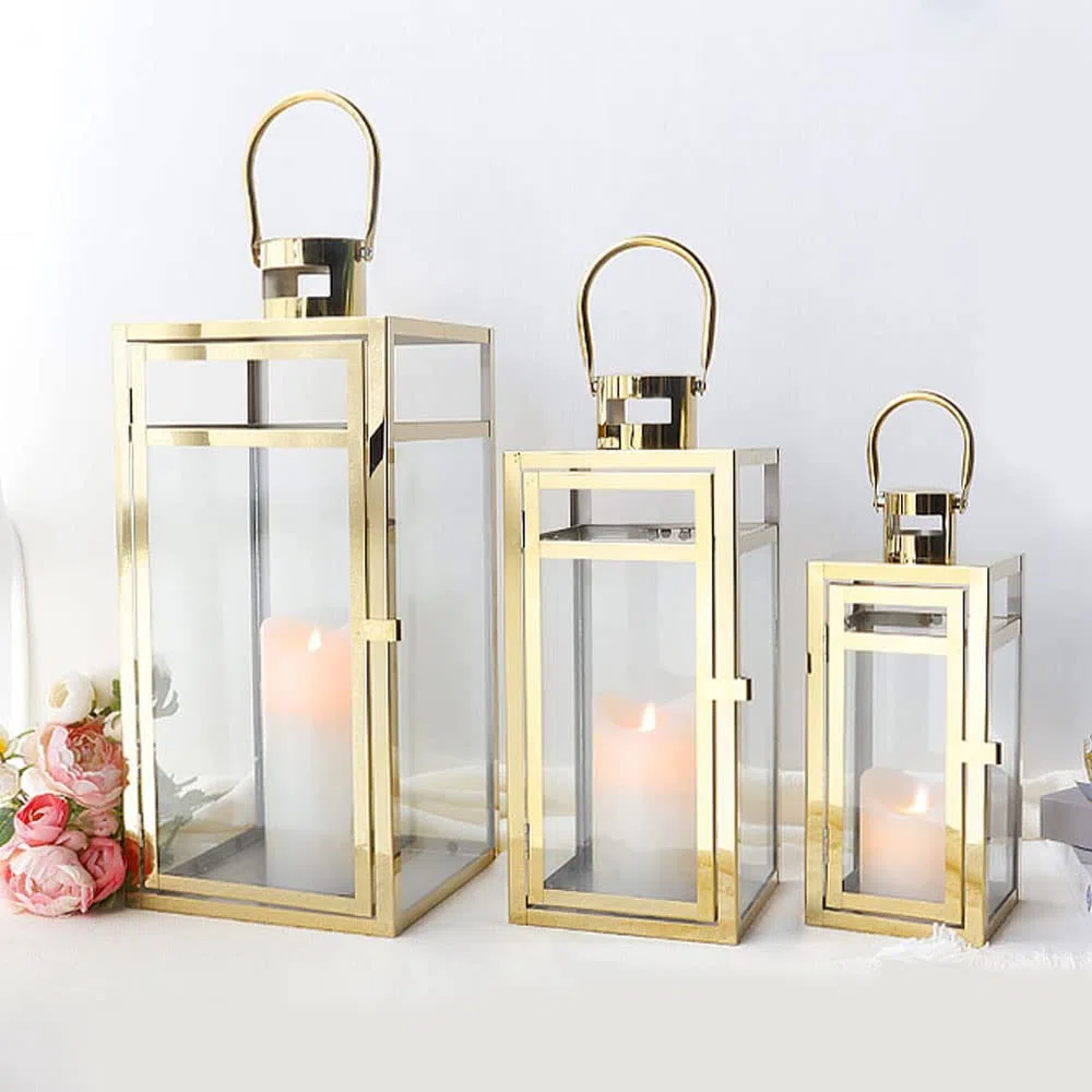 TRIROCKS Set di 3 Lanterne in Acciaio Inossidabile 48 cm, 38 cm, 30 cm Alte, Porta Candela in Metallo con Vetro Trasparente per Decorazioni Casa, Soggiorno, Eventi (Oro)